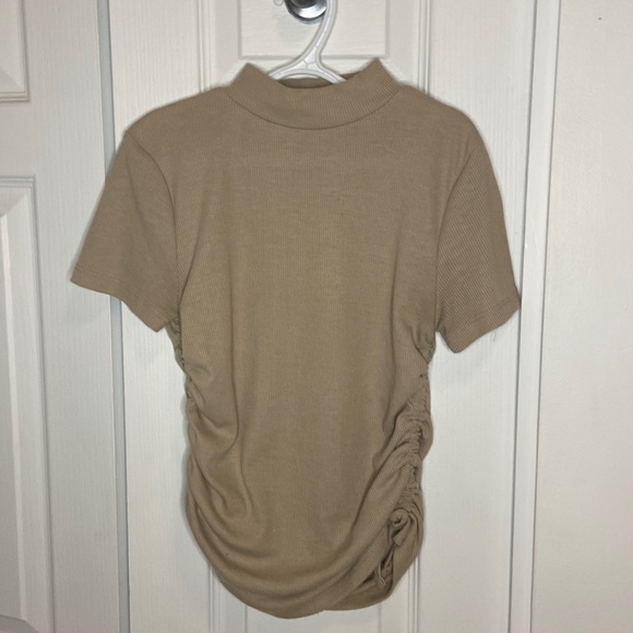 Beige shirt with straps on the side. - Picture 1 of 4